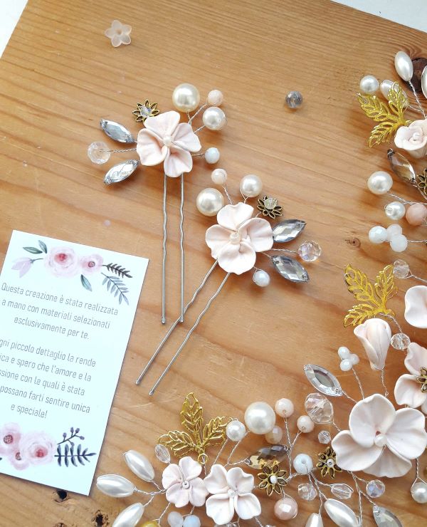 Coppia di forcine sposa con fiori rosa