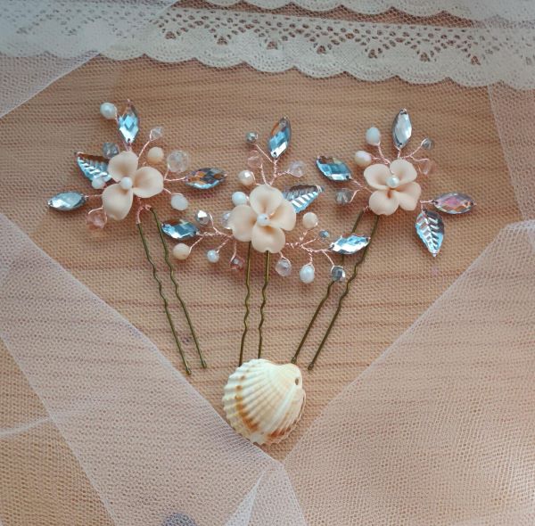 Forcine con fiori rosa ed elementi argento